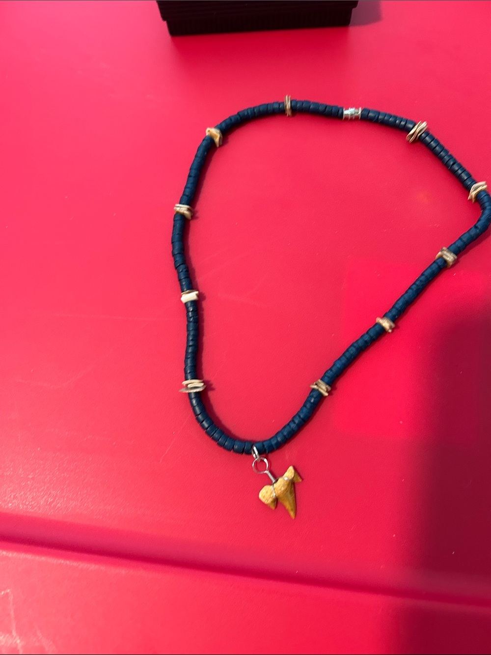 Handcrafted Blue Bead Necklace with Gold Tooth Charm